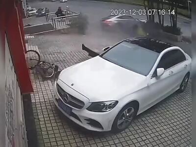 A drifting car collides with a bike