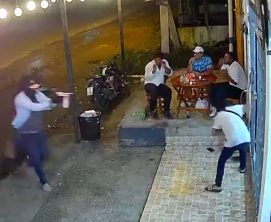 Drinks At The Bar Interrupted By Group Of Hitmen