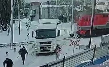 collision between a train and a huge truck 
