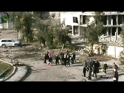 2 Videos: The UN Evacuation Of Homs And The Intervention By The Plainclothes Government Forces