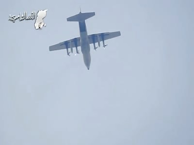 Iranian Air Force C-130 Drops Supplies On Besieged Syrian Government Forces