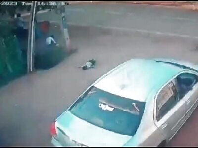 Two-year-old playing on roadside gets crushed by car. India, 