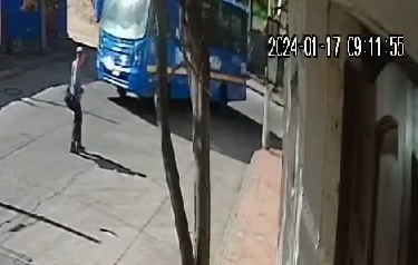 Stupid bus driver hit old man crossing the street 