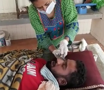 Indian female doctor removing eyes from recent dead body 