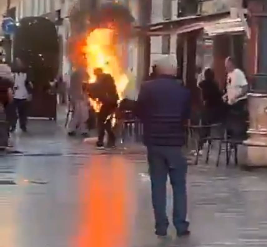 Man Sets Himself Ablaze In Front Of A Crowd
