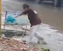 Drunk Man Falls Directly in Sewer.