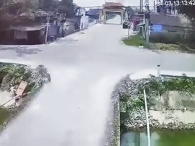 Student on bike gets disappeared by speeding truck.
