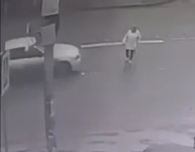 Old Russian woman crossing street rag dolled by drunk driver 