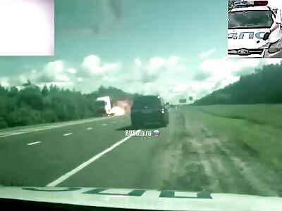Dude Drives into Oncoming Lane and Collides with Truck