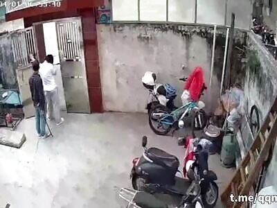 Man hits two people with an iron bar