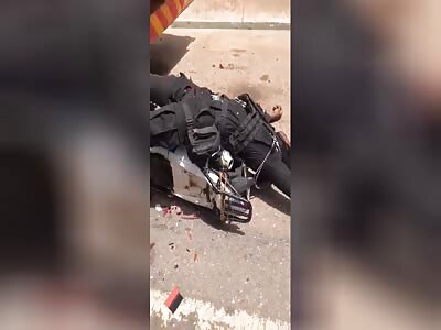 A Ghanaian policeman on a motorcycle crashed into a truck 