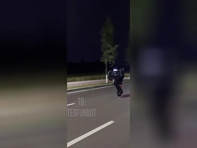 Chinese motorcyclist almost lost his ass
