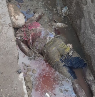 Haitian gang member killed and dumped in sewer 