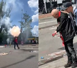 Shocking Moment Football Fan Blows His Fingers Off after Lighting a Flare Outside a Stadium