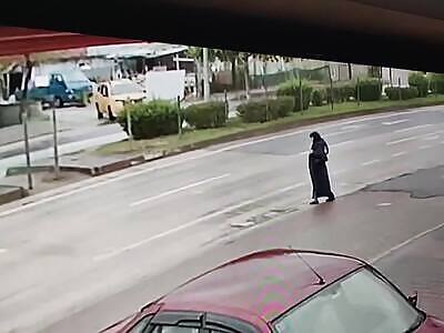 Woman Crossing The Road vs Big Truck