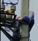 Worker Sizzle on an Electric Pole.