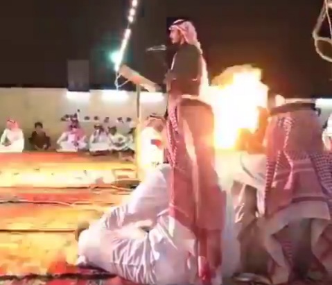 Egyptian extinguishes a cigarette in a pail full of gunpowder