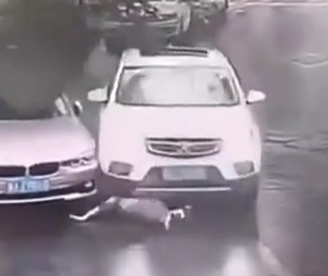 Chinese Woman horrifically crashed by female driver 