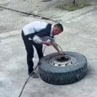 Mechanic Takes Tire Explosion to the Face.