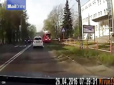 Oblivious Woman Run Over by a Tram