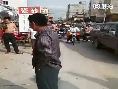 Chinese Street Justice. Bike Thief Beaten in Public