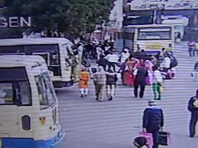 Elderly Man Gets Crushed Between Two Buses at the Bus Station