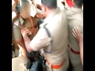 Senior Cop Molesting Female Colleague During Protest