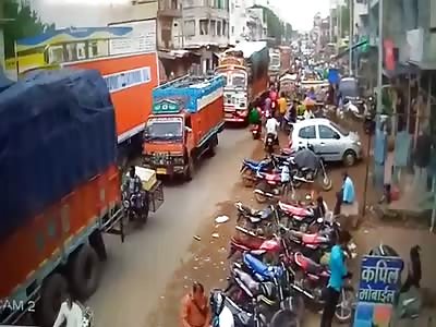 Two Men on a Bike Crushed by Truck