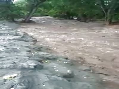 Body Getting Washed Away in Flood