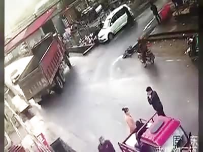 Biker Getting Run Over by Truck