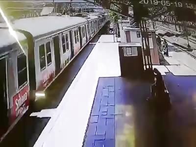 Woman Holding her Kid Jumps in Front of Train