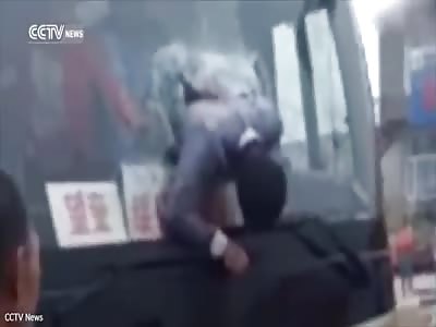 Shocking moment man smashes his head through bus window
