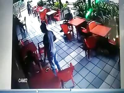 Man shoots and kills a stupid thief inside a bakery.
