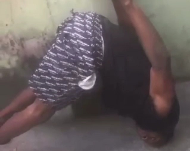 Thief captured and punished in Nigerian police station 