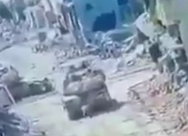 Qassami fighter blowing mirkava tank 