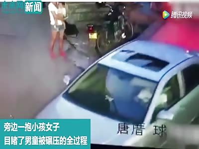 Woman watches as a kid is run over by car, does nothing to help