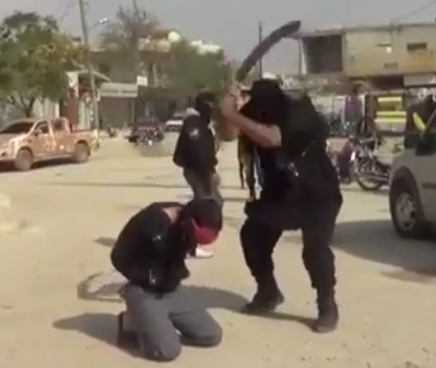 NEW: Man is Beheaded by Sword Blow - ISIS Raw Video