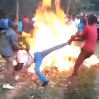 The Angry Mob Uses a Alleged Thief to Keep Their Bonfire Lit