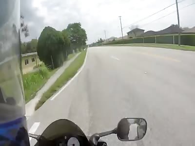 Road Raging Lunatic Assaults Biker While Driving and Tries to Run Him Off the Road
