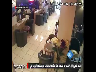 police was dressed as a civilian is a terrorist operation inside the coffee shop and abusing Customers 
