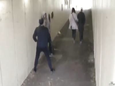 couple crosses two thugs through a tunnel