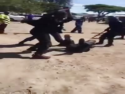 Police In Zimbabwe Beat Up Protestor 