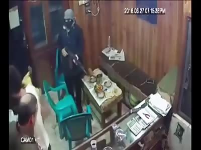 Terrifying moment armed robbers hold jewellery store staff at gunpoint