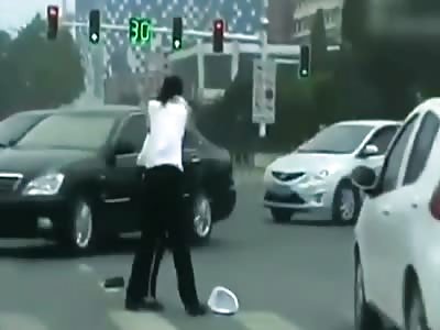 Two POLICE WOMEN fight in the street