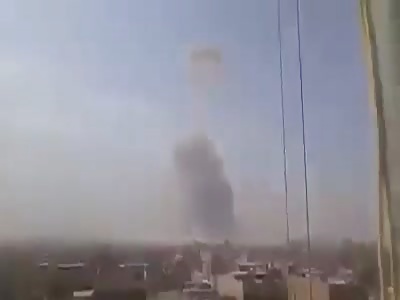 The moment of explosion of a weapons depot in the industrial area in Baghdad, al-Obeidi