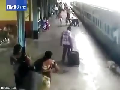 Jaw-Dropping Moment Woman Slips between Platform and Moving Train