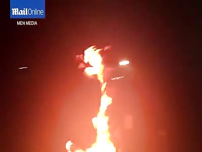 Shocking Moment  man is set on FIRE before running into the darkness