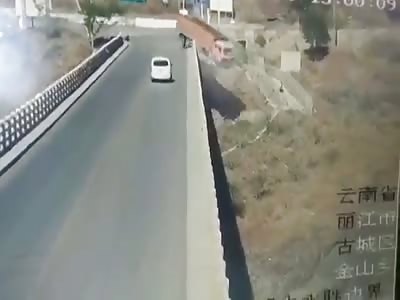 Out of Control Truck Falls from Bridge 