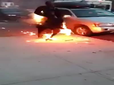 New York Man On Fire Calmly Removes His Clothes And Walks Away! 