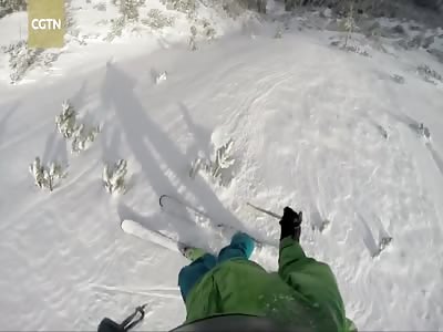 Skier dives for his life to avoid avalanche